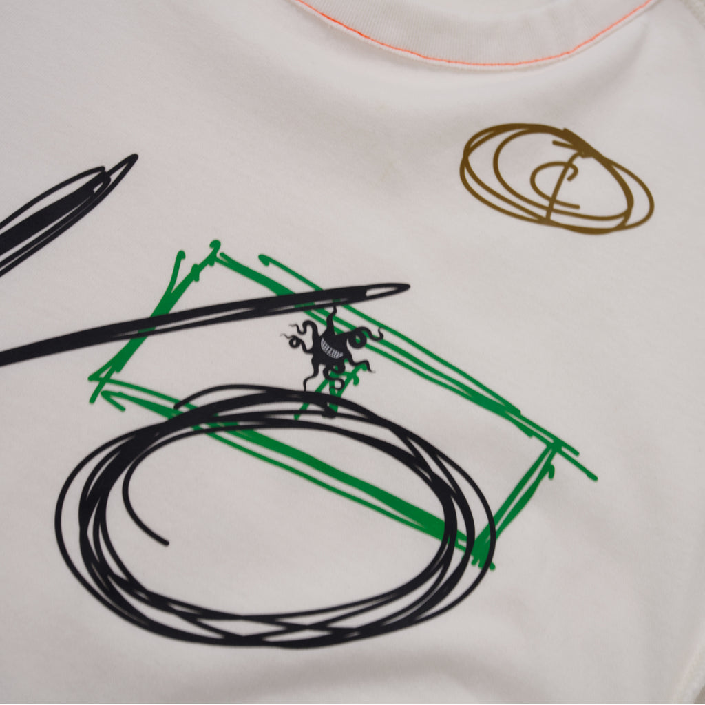 Close-up of sketched line art on a white normal;c movement t-shirt with a small, eyeless logo