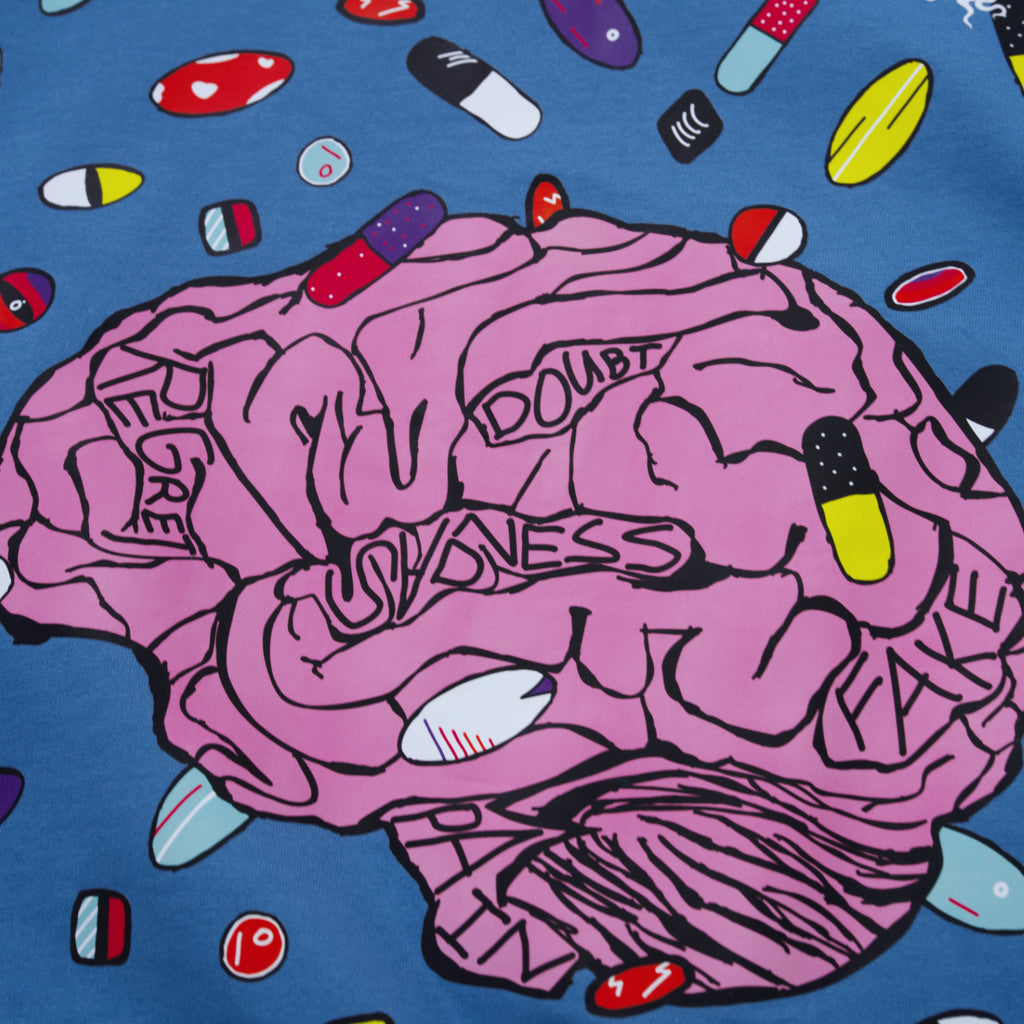 Illustration of a brain with text and colorful pills on a blue background